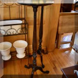 F13. Pair of tall plant stands with claw-and-ball feet.